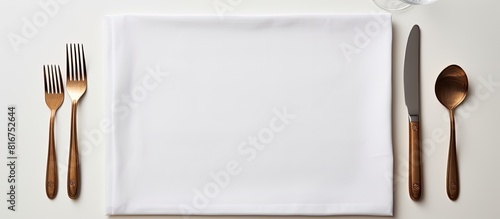 A top down view of a light background with a clean napkin providing ample space for images