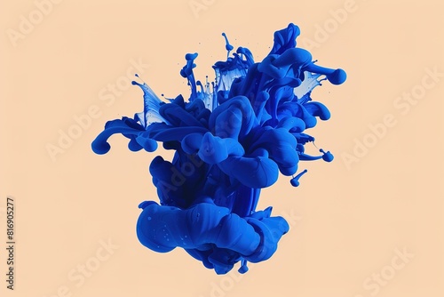 Blue ink splash on peach background, dynamic liquid shape, isola