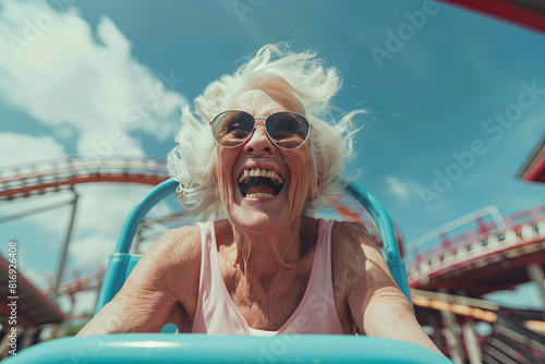 Senior woman experiencing the thrill of a roller coaster, defying age stereotypes with zest for life