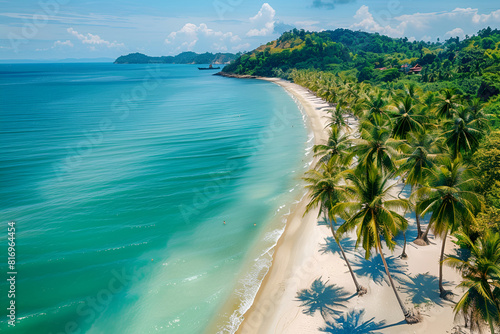 Sandy beach in Thailand. Palm trees, sea, sand. Bird's eye view.