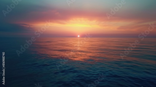 sunset over a calm ocean, with the sky ablaze 