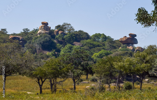 African landscape with natural balancing rocks on a hilltop in Zimbabwe.