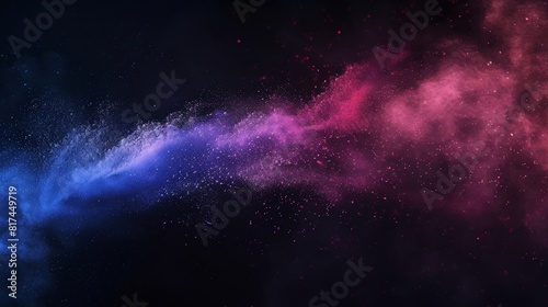 Abstract exploding colorful powder on black background.