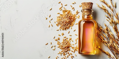 Rice bran oil over a glass bottle depicting brown rice seeds, foliages, and ears of rice strewn over a white setting lovely array and space, Generative AI.