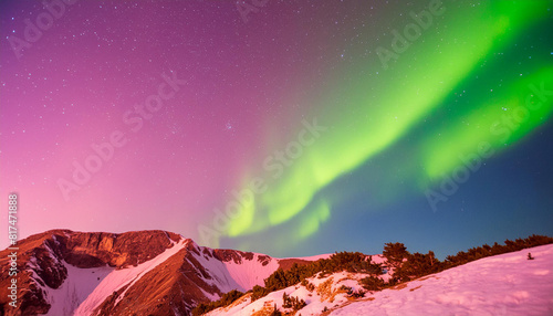 The sky is filled with a beautiful display of green auroras. The mountains in the background add to the serene and peaceful atmosphere