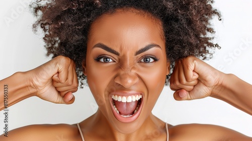 A woman with afro hair is loudly expressing her emotions directly at the camera