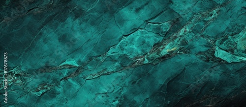Copy space image of a rough natural surface with a dark turquoise background