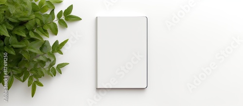 A modern e book reader is placed on a white background creating a flat lay composition with ample room for additional text