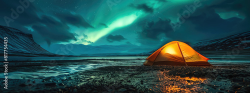 A glowing yellow camping tent under a beautiful green northern lights aurora. Travel adventure landscape background. Photo composite