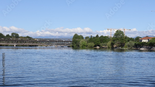 Bridge over lake Maggiore in a sunny day in sesto Calende in Lombardy, Italy.