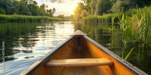 Relaxing canoe view in water of beautiful lake, coast at sunset, nobody. Wooden boat on the calm fresh water of the lake. Nature relax wallpaper.