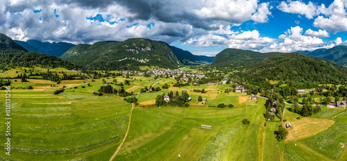 Aerial view of Stara fuzina village in Slovenia in Julian Alps. Popular touristic destination in Slovenia. Bohinj Lake, Church of St John the Baptist. Triglav National Park, Julian Alps, Slovenia.