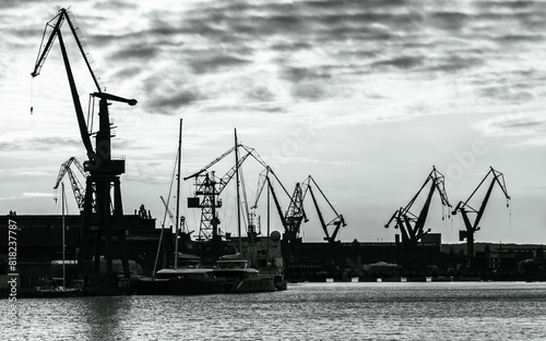 Cranes of the Gdansk shipyard in black and white, Baltic coast