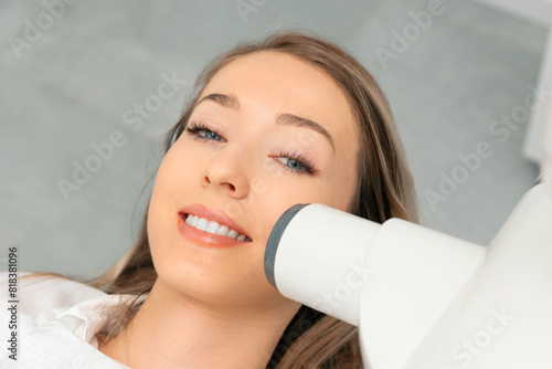 Dentist takes an x-ray picture of the tooth.