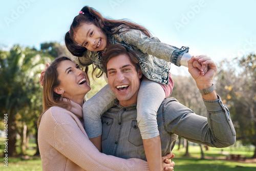 Family, parents and girl in park for piggyback, playing and bonding together with smile. Happy people, mother and father with child outdoor in nature for relaxing, recreation or physical activity