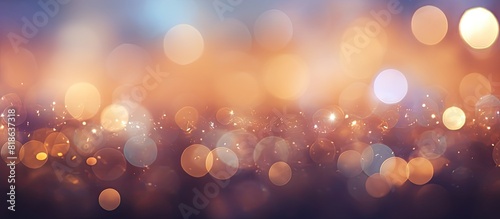 The background features an abstract texture with a play of light bokeh providing an ideal copy space image