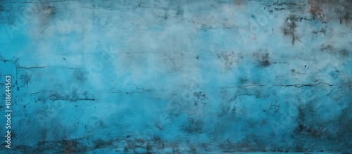 Blue and turquoise textured concrete wall with no objects or images occupying the space. Creative banner. Copyspace image