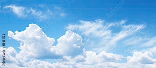 The copy space image captures a pleasant weather with clear skies and fluffy clouds