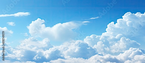 A scenic view of the clear blue sky with white clouds drifting across 39 characters. Creative banner. Copyspace image
