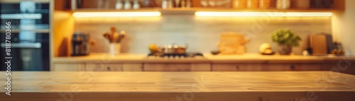 Blurred image of a kitchen interior, featuring sleek cabinets and a clean, organized layout, emphasizing a stylish cooking environment