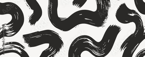 Seamless pattern of hand-drawn curly lines and squiggles, black on white background.