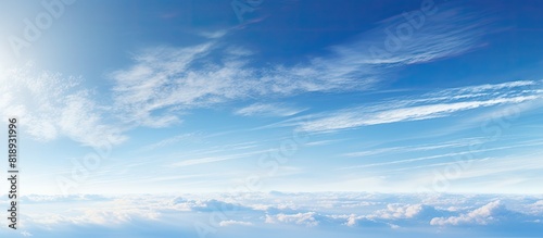 Panoramic format image showcasing the blue sky adorned with contrails leaving traces across the vast expanse Copy space image