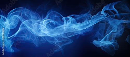 Incorporating the darkness concept here s a captivating blue smoke abstract on a black background offering ample copy space for creativity