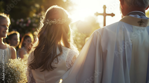 Girl with Priest During First Communion Ceremony - A Moment of Spiritual Significance