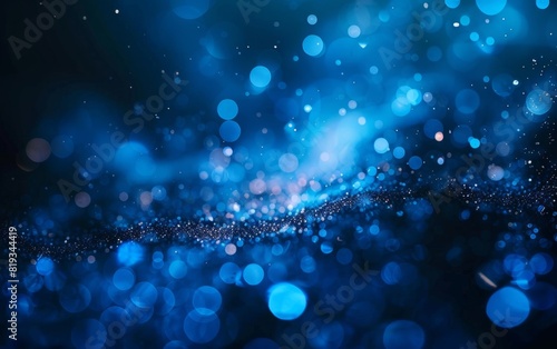 Dark background with dispersed glowing blue bokeh lights.
