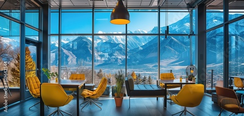 A trendy coworking space with floor-to-ceiling windows showcasing a picturesque mountain landscape