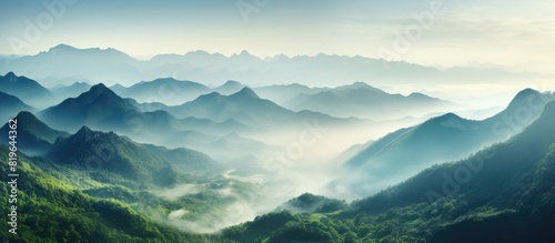 Spectacular view of a mist covered mountain valley with a beautiful scene and copy space image