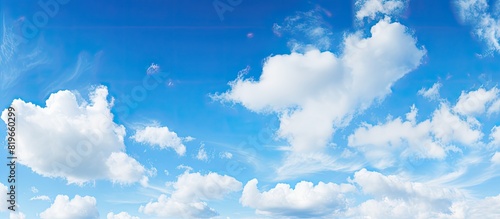 Sunny day with a blue sky and clouds providing a stunning natural background ideal for copy space image