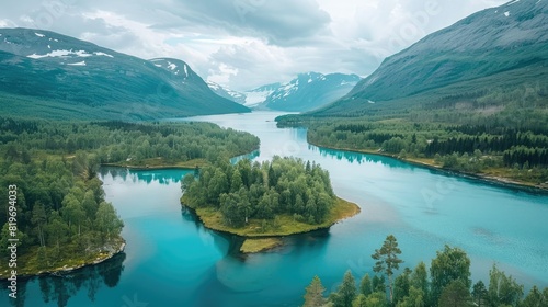 Scenic aerial view of the mountain landscape with a forest and the crystal blue river in Jotunheimen National 