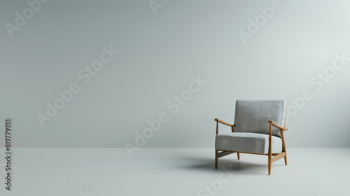 Minimalist composition with a lone modern armchair against a blank wall.