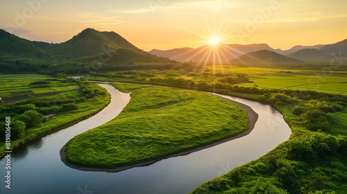 A tranquil river winding through a lush green valley, with the sun setting behind distant mountains casting a warm golden glow over the landscape. 32k, full ultra HD, high resolution