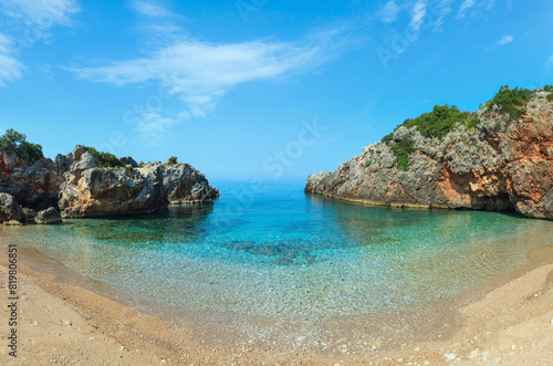 Morning summer Ionian sea coast view with beach, Albania. Two shots stitch panorama.