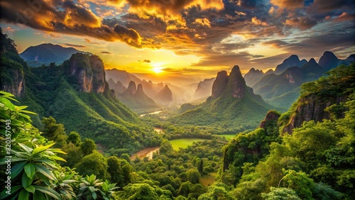 A verdant valley carpeted with lush foliage, framed by rugged mountains and bathed in the warm glow of the setting sun.