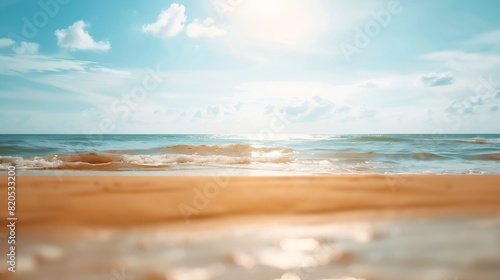 Abstract blur defocused background nature of tropical summer beach with rays of sun light Golden sand beach sea water against blue sky with white clouds Copy space summer vacation conc : Generative AI