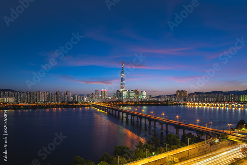 skyline of seoul by Han River in south korea at night