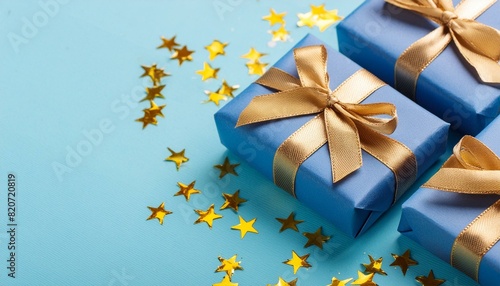 プレゼントと星の装飾、水色の背景
