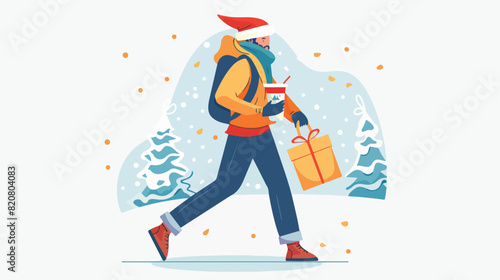 Happy man going outdoors with Christmas gift box and