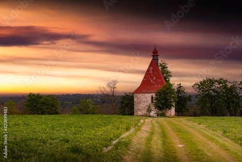 Old church in the summer field. Dobronice u Bechyne, Czech republic.