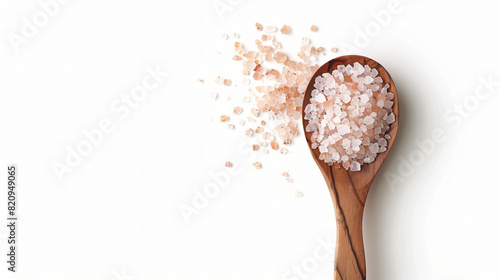 Wooden spoon with Himalayan salt on white background -