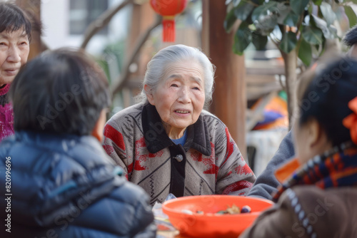 Elders sharing stories and wisdom with younger generations during Lunar New Year gatherings, passing down traditions and teachings to preserve cultural heritage and strengthen family bonds.