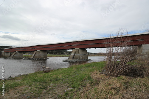 Perrault Covered Bridge over Chaudière River built in 1924 in Notre-Dame-des-Pins, Qc