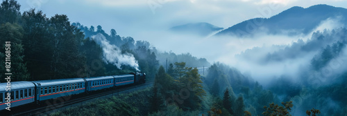 A classic train chugs through the misty mountains in the early morning, with fog enveloping the scene