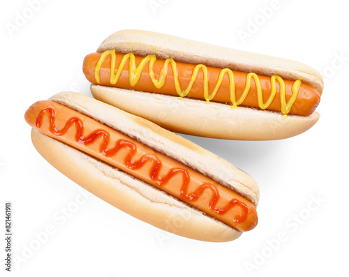 Tasty hot dogs with ketchup and mustard isolated on white, top view