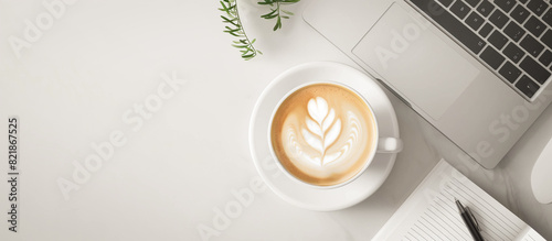 coffee latte with laptop in the table concept background