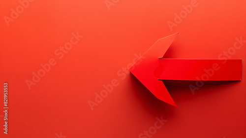 One zigzag paper arrow on red background top view. Spa