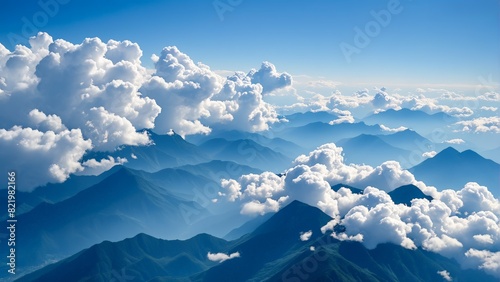 mountain ranges on which clouds lie to the horizon